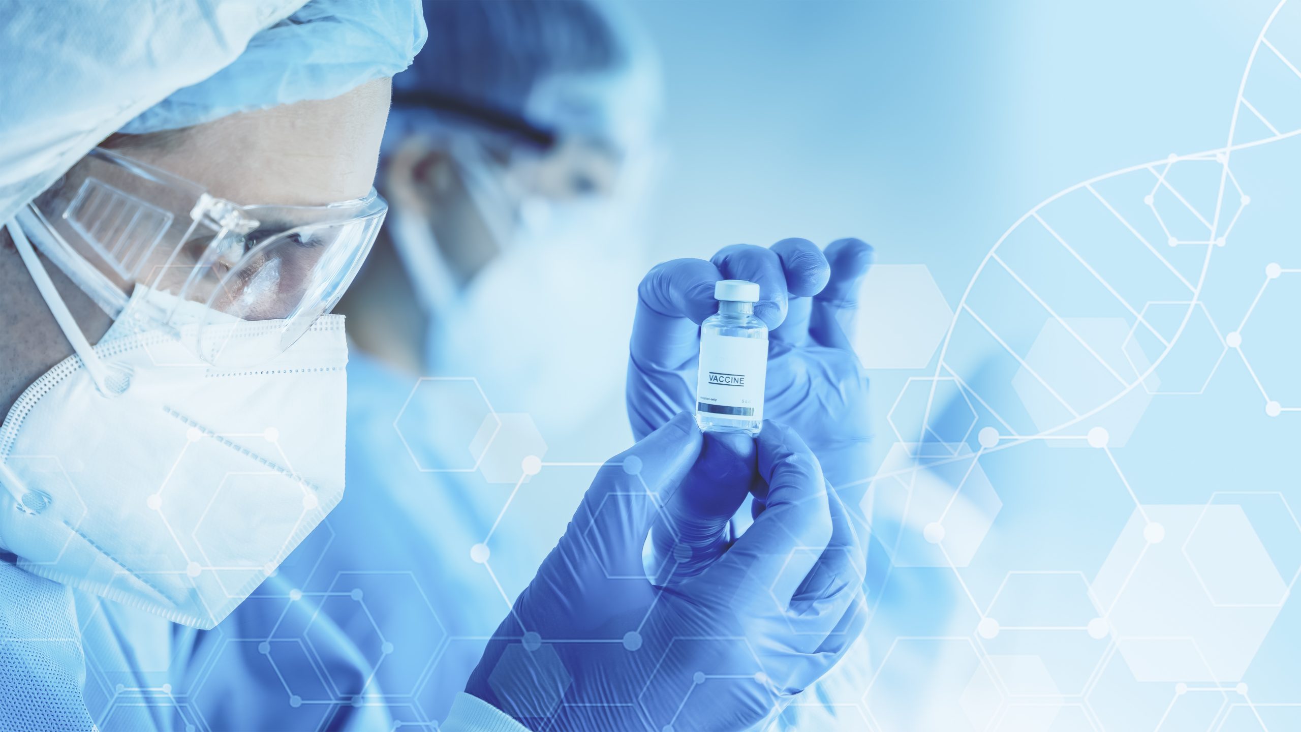 vaccineresearchanddevelopmentbackgroundofresearchscientistholdingvaccine