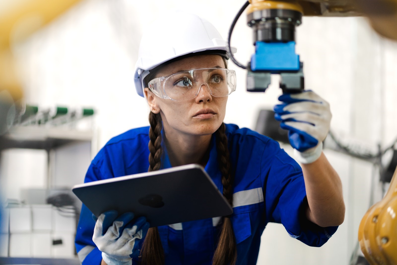 Facility Maintenance woman wearing bllue